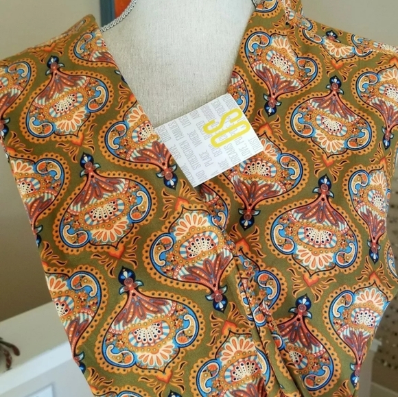 LuLaRoe Pants - Lularoe 70's Vibe Leggings NWT OS Retired Bulbs